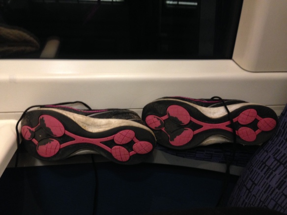 Drying my shoes out on the heater of the train