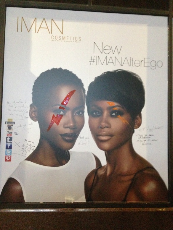 Iman's makeup line was in the shop window next to the mural--obviously visitors decided to add the ad to the celebration